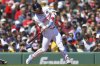 Boston Red Sox's Trevor Story hits a one-run single in the third inning of a baseball game against the Chicago White Sox, Monday, April 21, 2025, in Boston. (AP Photo/Steven Senne)