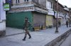 An Indian security officer patrols a shopping area in Pahalgam a day after militants indiscriminately opened fire on tourists near the town, Indian controlled Kashmir, Wednesday, April 23, 2025. (AP Photo/Dar Yasin)