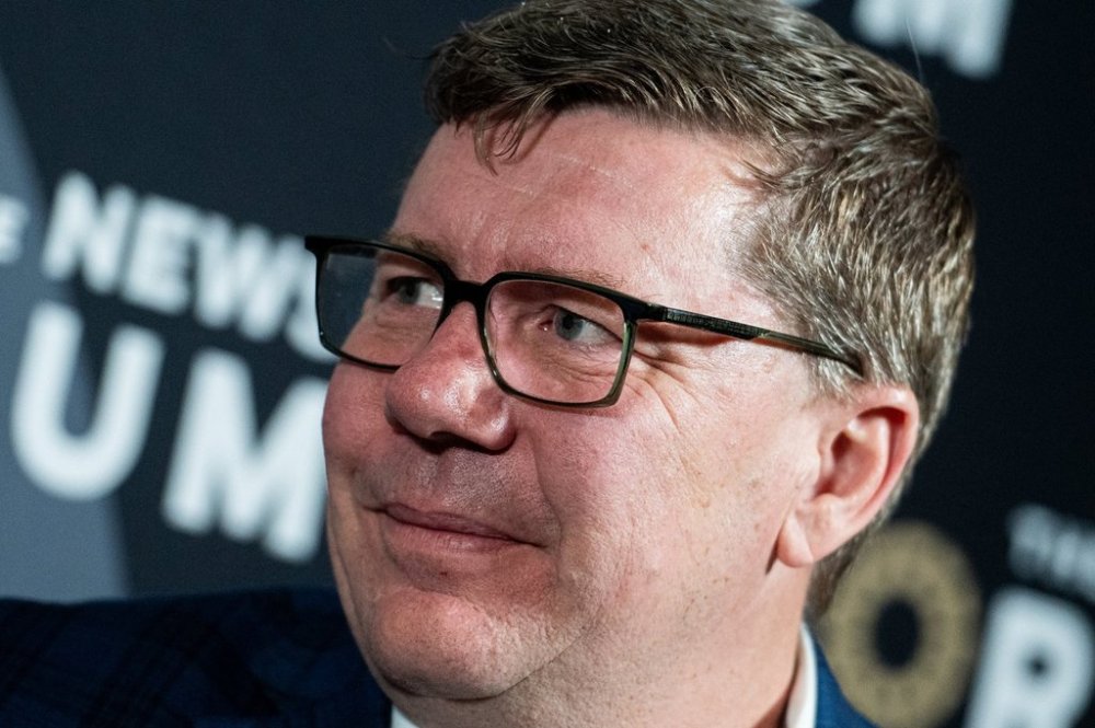 Saskatchewan Premier Scott Moe looks on following a media interview on the sidelines of the Canada Strong and Free Network annual conference in Ottawa, on Friday, April 11, 2025. THE CANADIAN PRESS/Spencer Colby