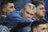 Manchester City's Erling Haaland sits on the stands prior to the English Premier League soccer match between Manchester City and Aston Villa at Etihad stadium in Manchester, England, Tuesday, April 22, 2025. (AP Photo/Jon Super)