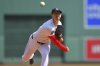 Boston Red Sox's Walker Buehler delivers a pitch to a Chicago White Sox batter in the first inning of a baseball game, Monday, April 21, 2025, in Boston. (AP Photo/Steven Senne)