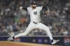 New York Yankees' Devin Williams pitches during the ninth inning of a baseball game against the Toronto Blue Jays Friday, April 25, 2025, in New York. (AP Photo/Frank Franklin II)