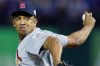 FILE - St. Louis Cardinals relief pitcher Octavio Dotel throws during the eighth inning in Game 5 of baseball's World Series against the Texas Rangers, Monday, Oct. 24, 2011, in Arlington, Texas. (AP Photo/Matt Slocum, File)