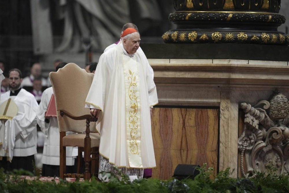 Delegate of the Holy Father, Cardinal Domenico Calcagno presides over the Chrism Mass on Ash St. Peter's Basilica at The Vatican, Thursday, April. 17, 2025. (AP Photo/Andrew Medichini)
