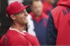 Los Angeles Angels relief pitcher Ben Joyce smiles as he talks with teammates in the dugout during the eighth inning of a baseball game against the Chicago White Sox in Chicago, Sunday, March 30, 2025. (AP Photo/Nam Y. Huh)