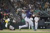 Seattle Mariners' Cal Raleigh hits a single that scores a two runs against the Athletics during the ninth inning of a baseball game Tuesday, May 6, 2025, in West Sacramento, Calif. (AP Photo/Scott Marshall)