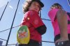 Youth ballplayer Grayson Cole, left, waits for his game to get underway with his Savannah Banana sliding mitt in his back pocket on April 27, 2025 in Monroeville, Pa. (AP Photo/Gene J. Puskar)