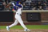New York Mets' Francisco Lindor (12) follows through on a three-run home run during the seventh inningof a baseball game against the Philadelphia Phillies Monday, April 21, 2025, in New York. (AP Photo/Frank Franklin II)