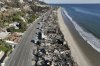 FILE - An aerial view shows the devastation from the Palisades Fire on beachfront homes Wednesday, Jan. 15, 2025 in Malibu, Calif. (AP Photo/Jae C. Hong, File)
