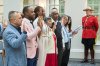 New Canadian citizens take the oath of citizenship during a Canada Day citizenship ceremony at the Assiniboine Park Pavilion in Winnipeg, Man., on Monday July 1, 2024. THE CANADIAN PRESS/David Lipnowski