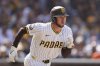 San Diego Padres' Jackson Merrill runs towards first base as he grounds out during the seventh inning of a baseball game against the Cleveland Guardians Wednesday, April 2, 2025, in San Diego. (AP Photo/Gregory Bull)