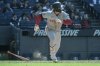 Boston Red Sox's Jarren Duran watches his RBI double off Cleveland Guardians relief pitcher Austin Hedges during the ninth inning of a baseball game Sunday, April 27, 2025, in Cleveland. (AP Photo/Phil Long)