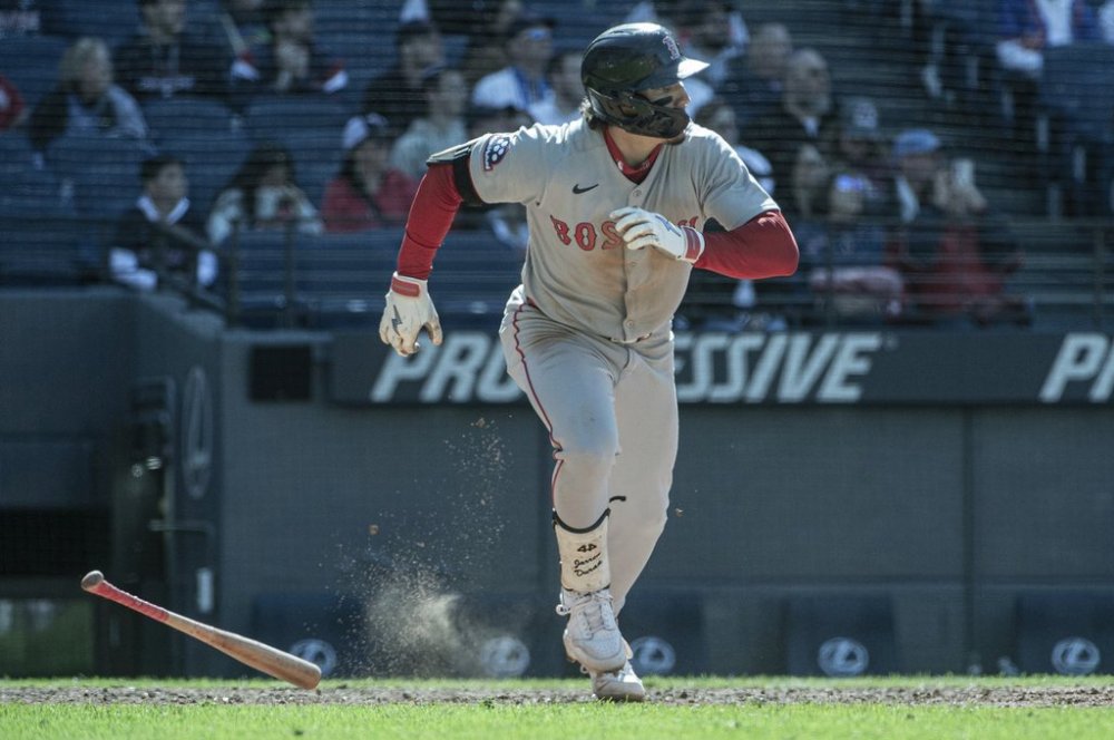 Boston Red Sox's Jarren Duran watches his RBI double off Cleveland Guardians relief pitcher Austin Hedges during the ninth inning of a baseball game Sunday, April 27, 2025, in Cleveland. (AP Photo/Phil Long)