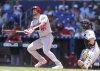 Cincinnati Reds' Austin Wynns (38) watches after hitting a solo home run during the third inning of a baseball game against the Miami Marlins, Wednesday, April 23, 2025, in Miami. (AP Photo/Lynne Sladky)