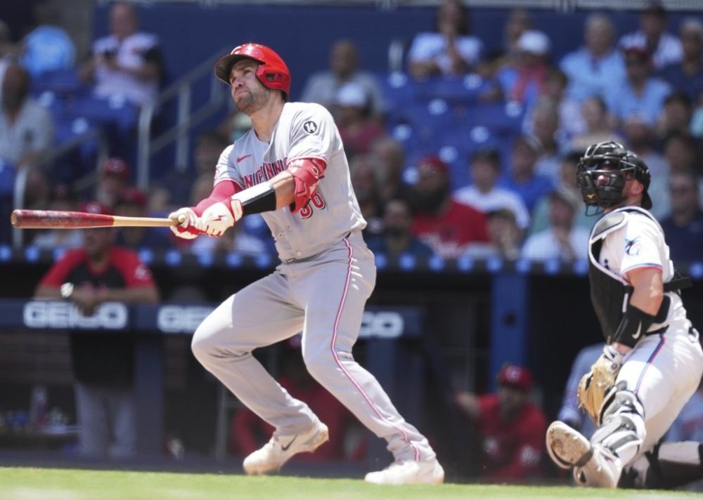 Cincinnati Reds' Austin Wynns (38) watches after hitting a solo home run during the third inning of a baseball game against the Miami Marlins, Wednesday, April 23, 2025, in Miami. (AP Photo/Lynne Sladky)