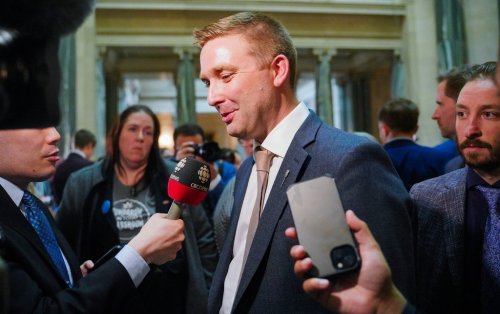 Saskatchewan Health Minister Jeremy Cockrill speaks to members of the media after the release of the Saskatchewan budget in Regina, on Wednesday, March 20, 2024. THE CANADIAN PRESS/Heywood Yu