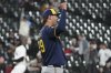 Milwaukee Brewers relief pitcher Trevor Megill celebrates after the Brewers defeated the Chicago White Sox in a baseball game in Chicago, Wednesday, April 30, 2025. (AP Photo/Nam Y. Huh)