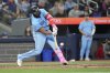Toronto Blue Jays' Vladimir Guerrero Jr. hits a three-run home run off Boston Red Sox pitcher Justin Slaten during eighth inning  MLB baseball action in Toronto on Thursday May 1, 2025. THE CANADIAN PRESS/Chris Young