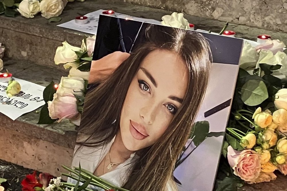 FILE - A portrait of Kesaria Abramidze, a transgender actor and model who was stabbed to death, is displayed at a vigil near parliament in Tbilisi, Georgia, on Sept. 19, 2024. (AP Photo/Sophiko Megrelidze, File)