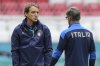 FILE - Italy's manager Roberto Mancini talks to Alberico Evani during a training session ahead of a Euro 2020 soccer championship round of 8 match against Belgium, at the Football Arena stadium in Munich, Germany, July 1, 2021. (AP Photo/Matthias Schrader, file)