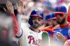 Philadelphia Phillies' Bryce Harper celebrates his run in the third inning of a baseball game against the Miami Marlins, Saturday, April 19, 2025, in Philadelphia. (AP Photo/Laurence Kesterson)