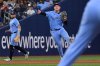 Toronto Blue Jays third baseman Will Wagner (7) throws to first base to put out Seattle Mariners third baseman Ben Williamson in fifth inning American League baseball action in Toronto on Sunday, April 20, 2025. THE CANADIAN PRESS/Jon Blacker