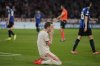 Bayern's Harry Kane reacts after missing a chance to score during the Champions League quarterfinals first leg soccer match between FC Bayern Munich and Inter Milan, at the Allianz Arena in Munich, Germany, Tuesday, April 8, 2025. (AP Photo/Matthias Schrader)