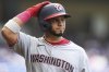 Washington Nationals' Keibert Ruiz reacts after flying out during the seventh inning of a baseball game against the Miami Marlins, Sunday, April 13, 2025, in Miami. (AP Photo/Lynne Sladky)