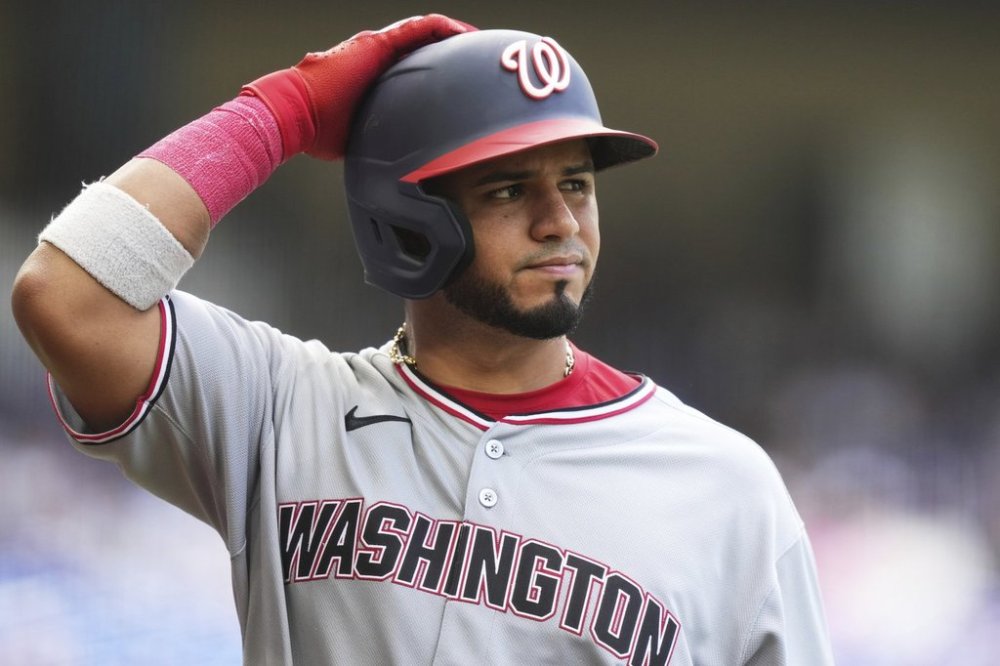 Washington Nationals' Keibert Ruiz reacts after flying out during the seventh inning of a baseball game against the Miami Marlins, Sunday, April 13, 2025, in Miami. (AP Photo/Lynne Sladky)