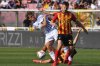 Lecce's Ylber Ramadani, right, and Como's Nico Paz battle for the ball during the Serie A soccer match between Lecce and Como 1907 at the Via del Mare Stadium in Lecce, Italy, Saturday, April 19, 2025. (Giovanni Evangelista/LaPresse via AP)