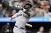 New York Yankees' Jazz Chisholm Jr. strikes out swinging during the sixth inning of a baseball game against the Baltimore Orioles, Monday, April 28, 2025, in Baltimore. (AP Photo/Stephanie Scarbrough)