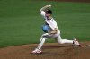 Atlanta Braves pitcher AJ Smith-Shawver throws during the seventh inning of a baseball game against the Cincinnati Reds, Monday, May 5, 2025, in Atlanta. (AP Photo/Butch Dill)