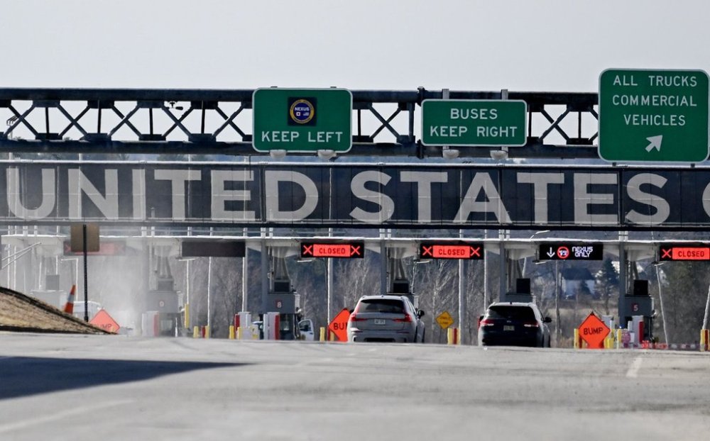 Vehicles approach the United States border crossing as seen from Saint-Bernard-de-Lacolle, Que., on April 10, 2025. THE CANADIAN PRESS/Graham Hughes