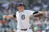Detroit Tigers starting pitcher Reese Olson pitches against the San Diego Padres during the fourth inning of a baseball game Wednesday, April 23, 2025, in Detroit. (AP Photo/Duane Burleson)