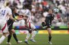 Arsenal's Mariona Caldentey, right, vies for the ball with Lyon's Melchie Dumornay during the women's Champions League semifinals, second leg, soccer match between Olympique Lyonnais and Arsenal at OL Stadium in Decines, outside Lyon, France, Sunday, April 27, 2025. (AP Photo/Thibault Camus)