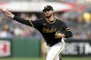 Pittsburgh Pirates pitcher Paul Skenes delivers during the second inning of a baseball game against the Washington Nationals, Monday, April 14, 2025, in Pittsburgh. (AP Photo/Matt Freed)