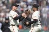 San Francisco Giants third baseman Matt Chapman, left, celebrates with first baseman LaMonte Wade Jr. after a baseball game against the Colorado Rockies in San Francisco, Saturday, May 3, 2025. (AP Photo/Jeff Chiu)