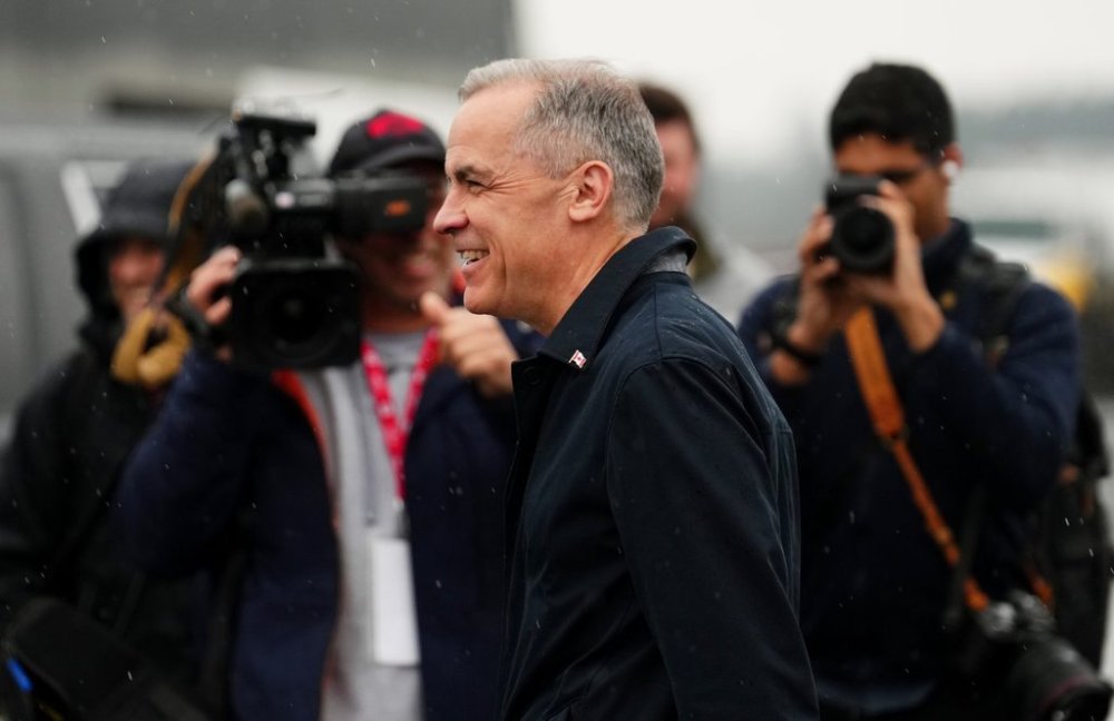Liberal Leader Mark Carney arrives in Victoria, B.C., during a campaign stop on Sunday, April 6, 2025. THE CANADIAN PRESS/Sean Kilpatrick