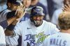 Tampa Bay Rays' Chandler Simpson is congratulated after scoring during the ninth inning of a baseball game against the New York Yankees, Saturday, April 19, 2025, in Tampa, Fla. (AP Photo/Mike Carlson)