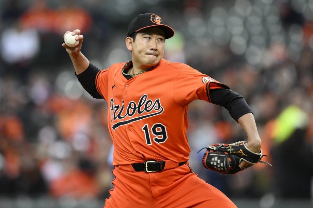 Baltimore Orioles starting pitcher Tomoyuki Sugano throws during the second inning of a baseball game against the Toronto Blue Jays, Saturday, April 12, 2025, in Baltimore. (AP Photo/Nick Wass)