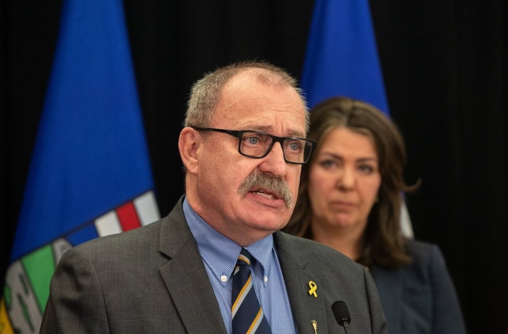 Minister of Municipal Affairs Ric McIver speaks in Edmonton on April 10, 2024. THE CANADIAN PRESS/Jason Franson.