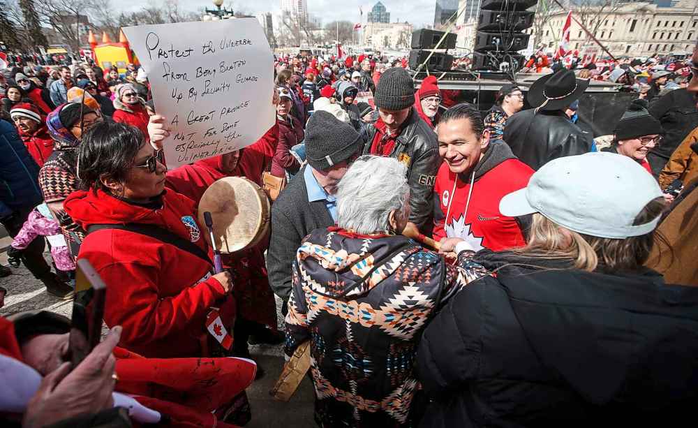 Premier Wab Kinew spoke with protestors during the rally. (John Woods / Free Press)
