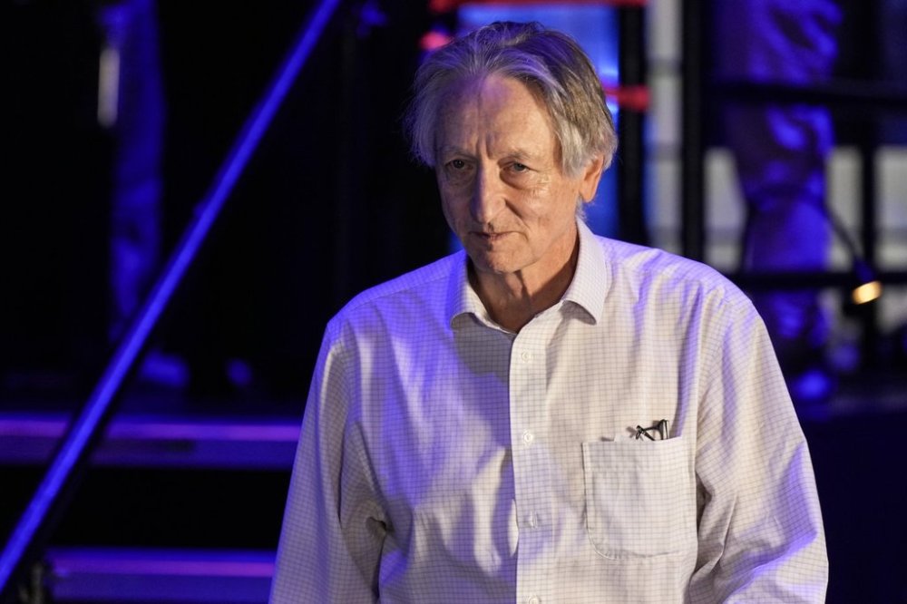 AI pioneer Geoffrey Hinton steps off stage at the Collision Conference, in Toronto, on Wednesday, June 19, 2024.THE CANADIAN PRESS/Chris Young