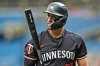 FILE - Minnesota Twins' Royce Lewis reacts after being called out on strikes on a clock violation during the first inning of a baseball game against the Tampa Bay Rays Thursday, Sept. 5, 2024, in St. Petersburg, Fla. (AP Photo/Chris O'Meara, File)