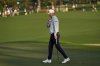 Patton Kizzire waves after making a putt on the second hole during the first round at the Masters golf tournament, Thursday, April 10, 2025, in Augusta, Ga. (AP Photo/George Walker IV)