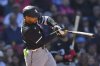 Chicago White Sox's Edgar Quero hits a two-run single in the seventh inning of a baseball game against the Boston Red Sox, Sunday, April 20, 2025, in Boston. (AP Photo/Steven Senne)