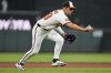Baltimore Orioles third baseman Ramon Urias fields a ground ball hit in by New York Yankees' Paul Goldschmidt and throws to first baseman Ryan Mountcastle for the out at first base during the seventh inning of a baseball game, Wednesday, April 30, 2025, in Baltimore. (AP Photo/Stephanie Scarbrough)