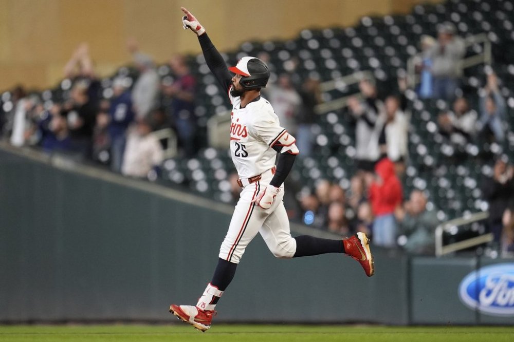 Minnesota Twins' Byron Buxton (25) runs the bases after hitting a 2-run home run during the seventh inning of a baseball game against the Chicago White Sox, Wednesday, April 23, 2025, in Minneapolis. (AP Photo/Abbie Parr)