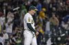 Athletics pitcher Mason Miller (19) reacts as he walks off the mound after a baseball game against the Chicago White Sox, Friday, April 25, 2025, in West Sacramento, Calif. (AP Photo/Sara Nevis)