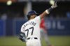 Tampa Bay Rays' José Caballero (77) celebrates his grand-slam home run while rounding first base during the first inning of a baseball game against the Los Angeles Angels, Wednesday, April, 9, 2025, in Tampa, Fla. (AP Photo/Phelan M. Ebenhack)